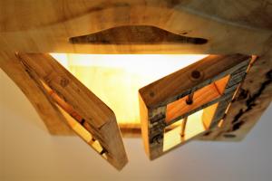 The Light watches the world through the window