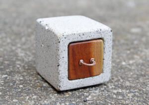 Engagement ring cabinet made of concrete, plum and copper